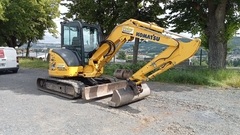 Komatsu PC55MR-5E0 z 3 łyżkami - Prawy Przód - Używany Mini koparka < 7t