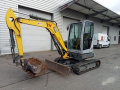Wacker Neuson EZ36 z 3 łyżkami koparki - Left Front in Polish translates to "Lewy Przód". - Używany Mini koparka < 7t